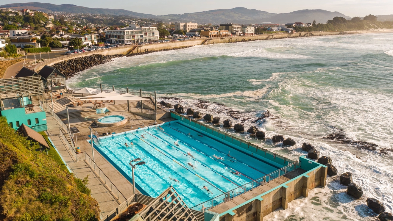 A heated saltwater pool at the end of St Clair beach, Dunedin, New Zealand. Image credit: DunedinNZ