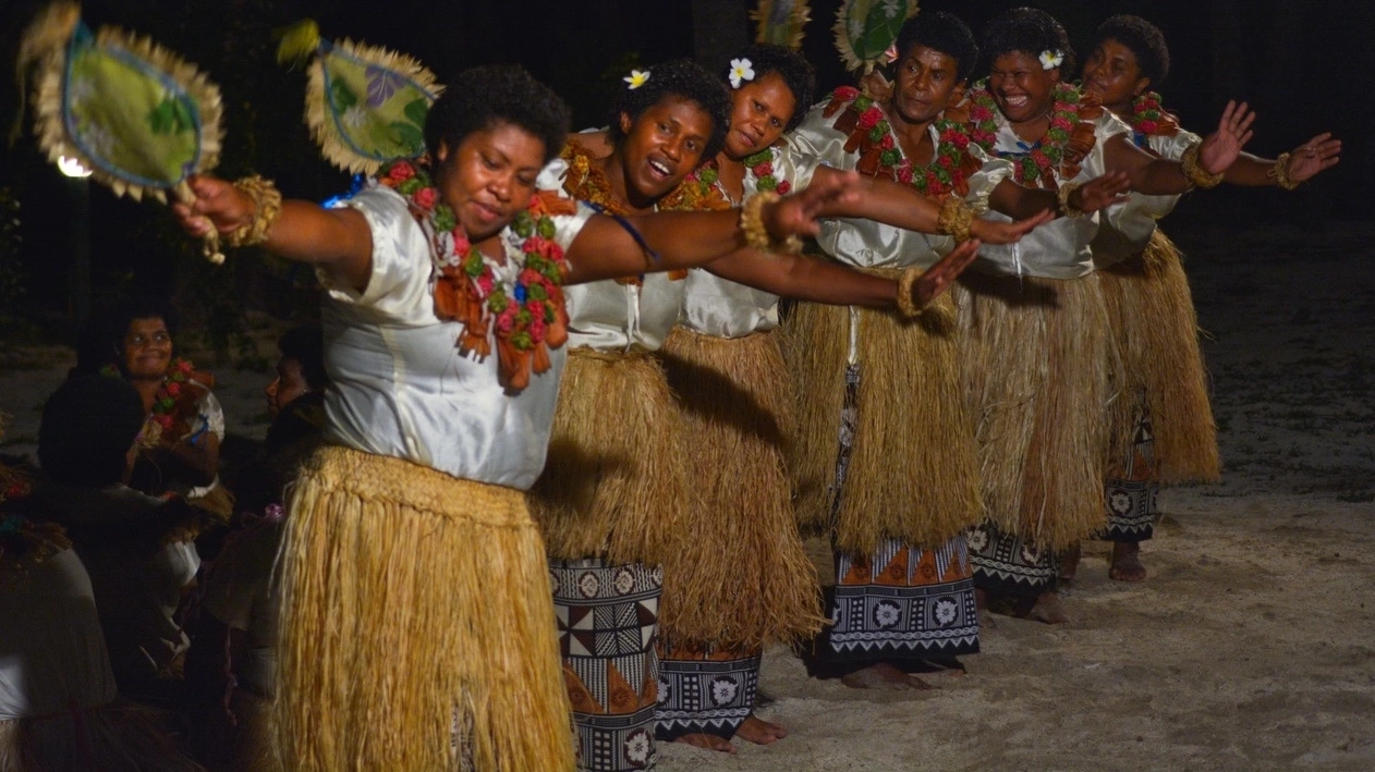Group of women dancing in traditional Fijian dress. Image credit: istock