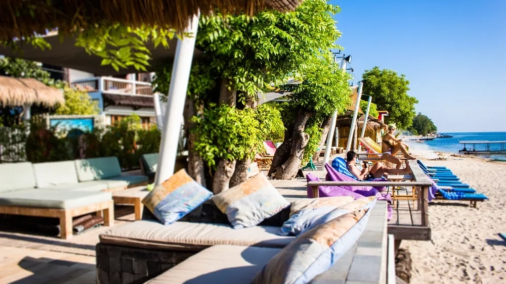 A couple on a sunrise resort in Gili.