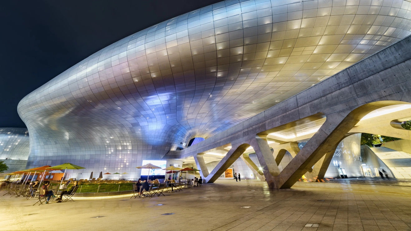 Exterior view of Dongdaemun Design Plaza at night, Seoul, South Korea. Image credit: efired – stock.adobe.com