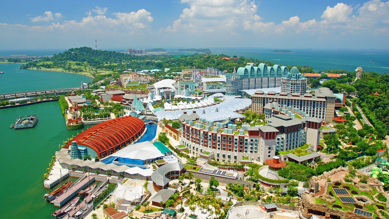 An aerial view of rides, hotels and attractions on Sentosa Island, Singapore. Image credit: stock.adobe.com