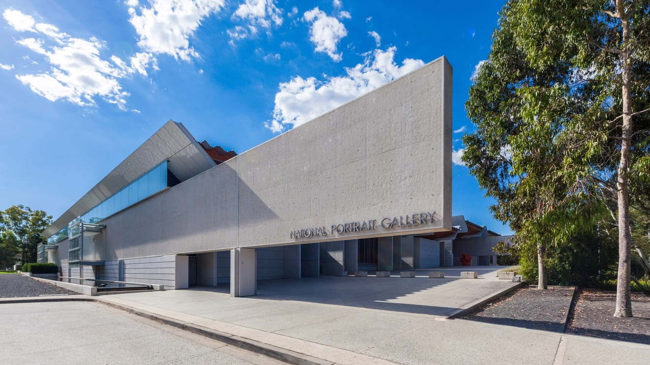 Exterior view of National Portrait Gallery with blue sky in background. Image credit: Greg Brave/Shutterstock