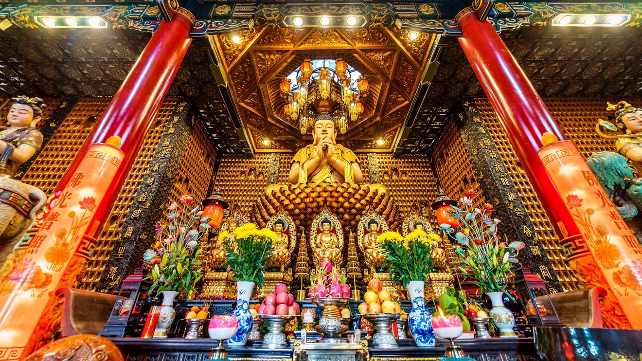 Dazzling interior of Chua Van Phat (Temple of 10,000 Buddhas) in District 5, Ho Chi Minh City, Vietnam. Image credit: stock.adobe.com