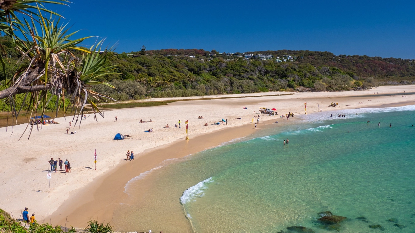 Aerial view of people at Cylinder Beach, North Stradbroke Island. Image credit: Tourism and Events Queensland